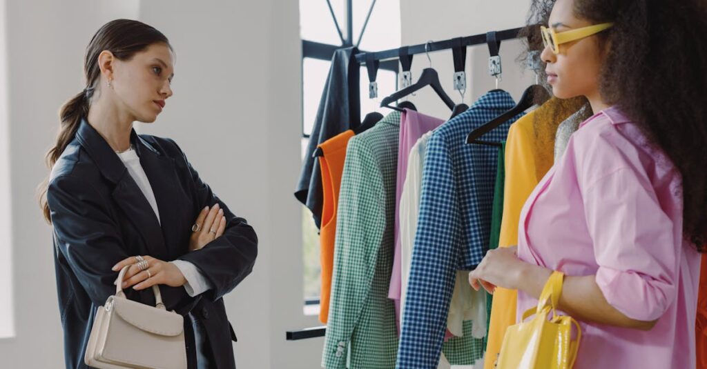 Two women browsing colorful clothing racks in a modern boutique.
